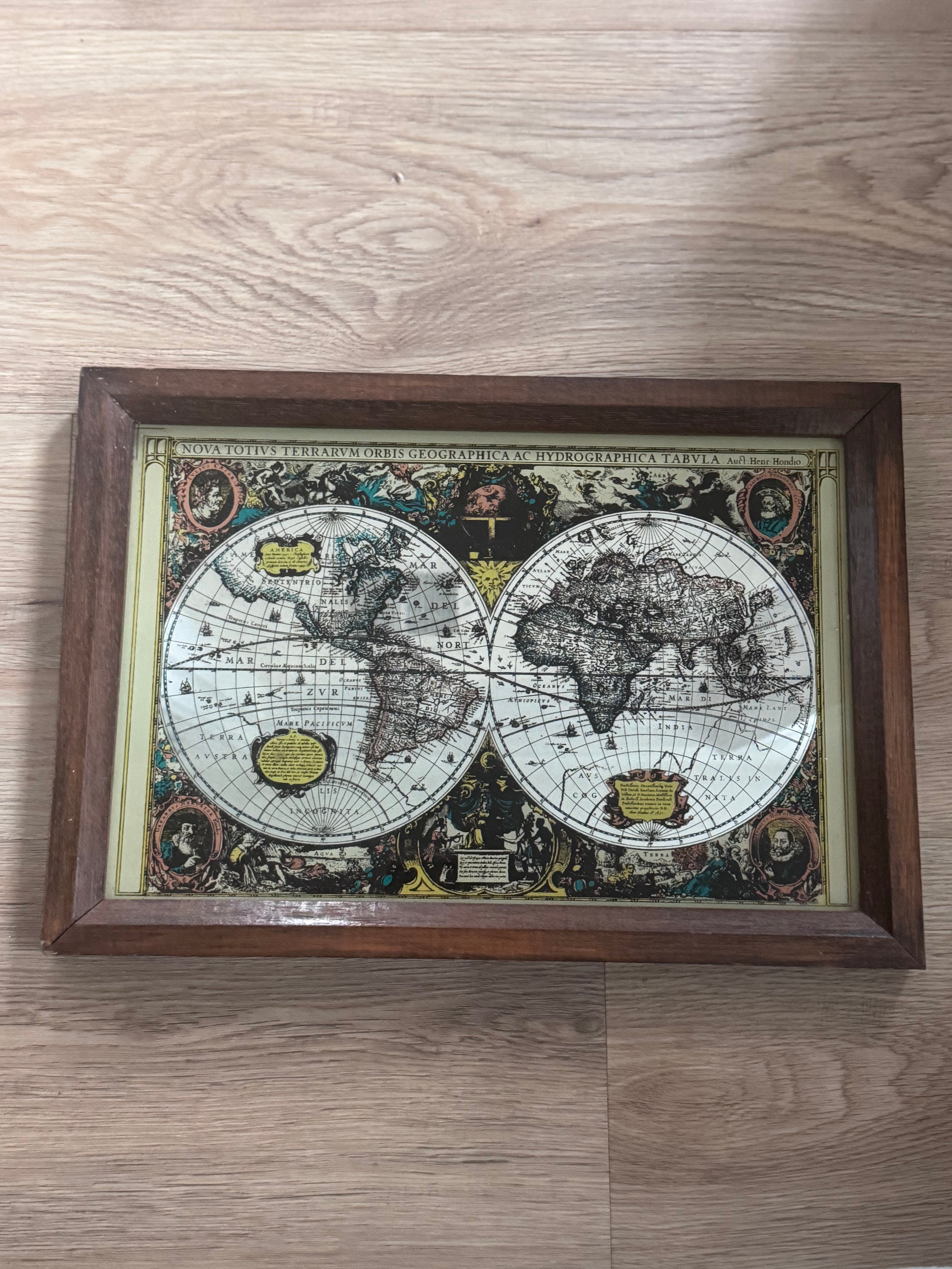 Framed reproduction of a 17th-century Dutch world map